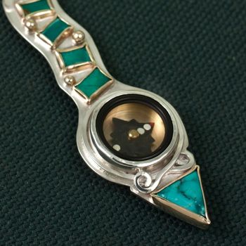 Path of Turquoise Compass Pendant Turquoise Compass Pendant in the shape of a Winding Path