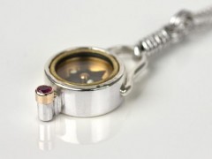 Elegant Silver Compass Pendant with Ruby