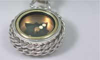 image of rope twist silver compass pendant