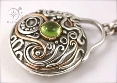 Gold and silver compass gift with peridot (g257)