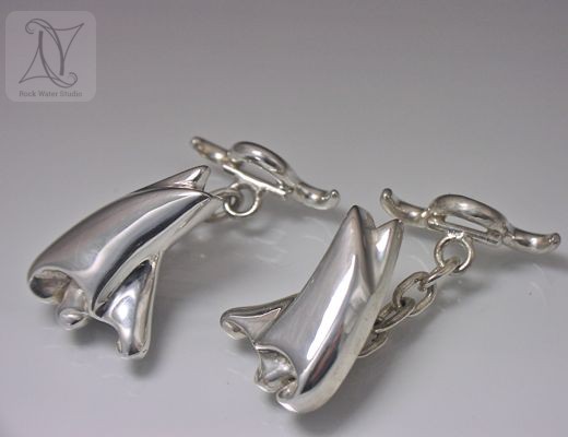 Handmade silver sail cufflinks
