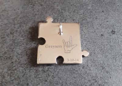 Jigsaw pendant in silver with engraving g542