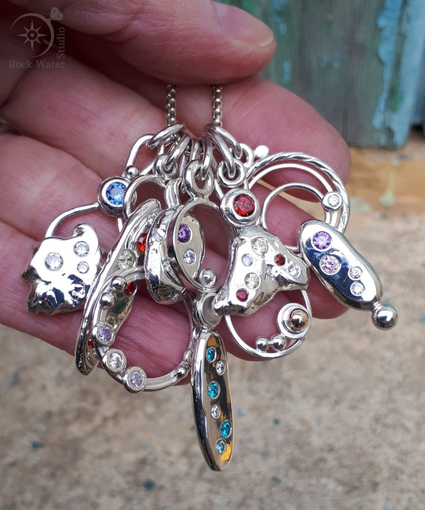 Silver pendants with colourful gemstones